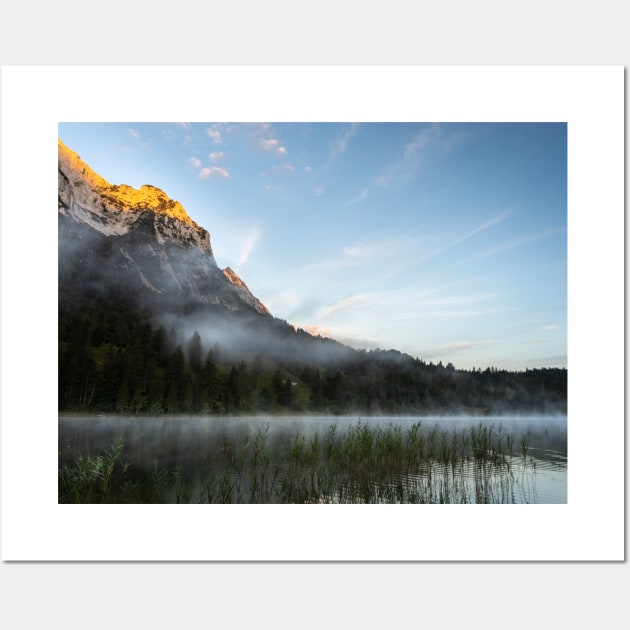 Mist on Alp mountain at Ferchensee. Amazing shot of the Ferchensee lake in Bavaria, Germany, in front of a mountain. Scenic foggy morning scenery at sunrise. Wall Art by EviRadauscher